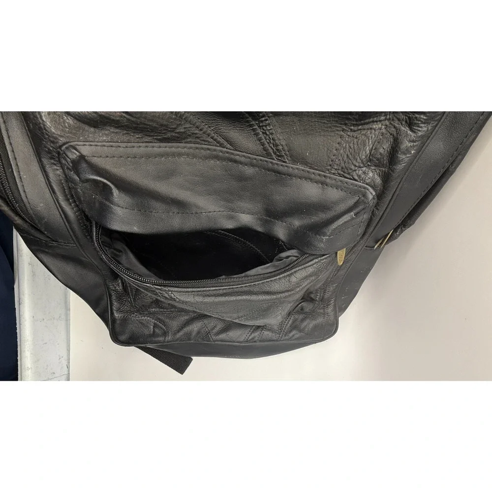 Vintage Patchwork Leather‎ Backpack – Classic Black Travel Bag with Unique Style